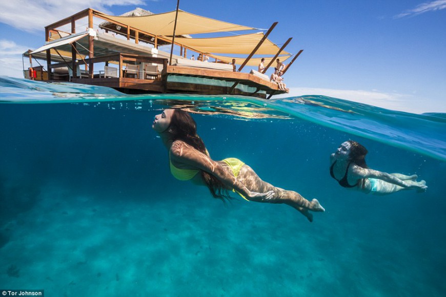 swimming at a slice of paradise the floating pizzeria called Cloud9 near Fiji